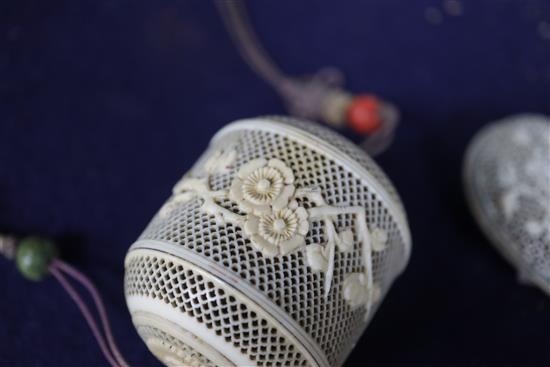 Two 19th century Chinese ivory pomanders and a similar purse